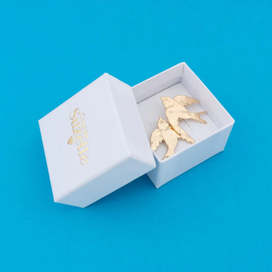 Pendientes acero golondrinas.