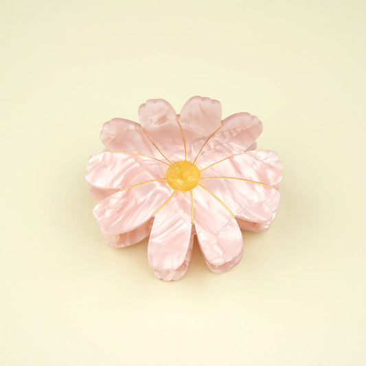 Pinza margarita rosa.