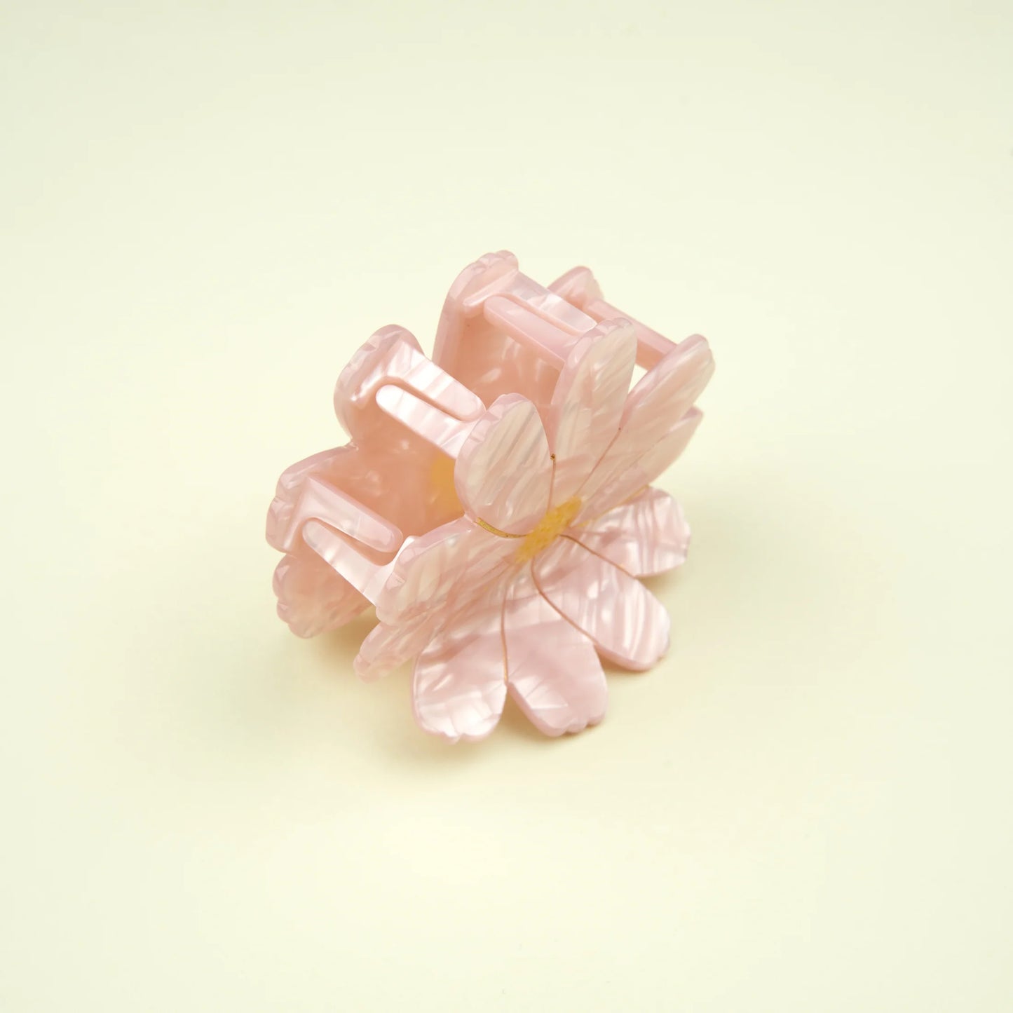 Pinza margarita rosa.