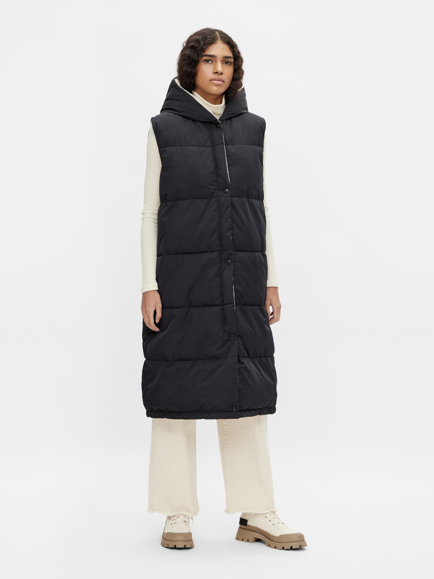 Chaleco maxi.