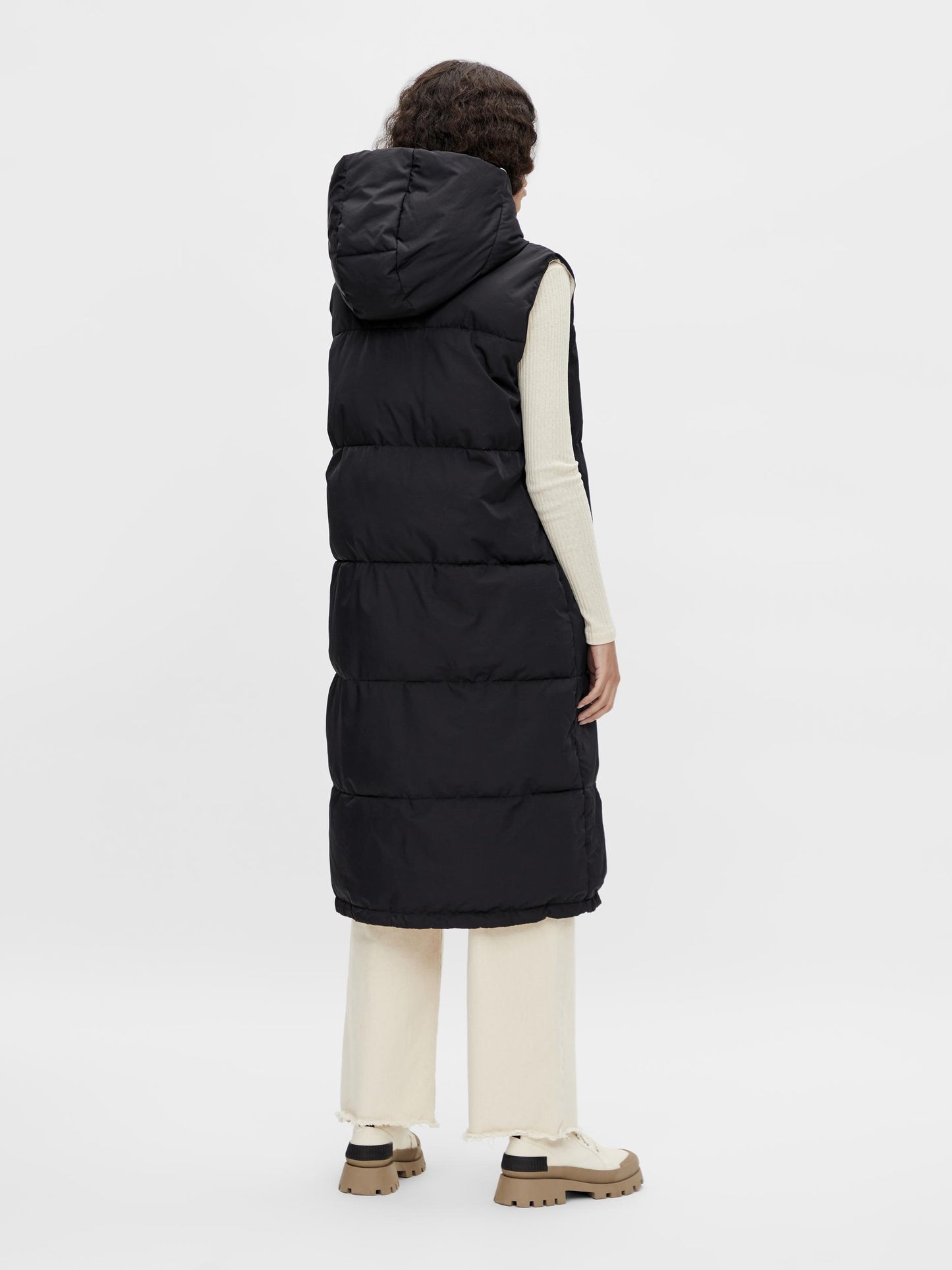 Chaleco maxi.