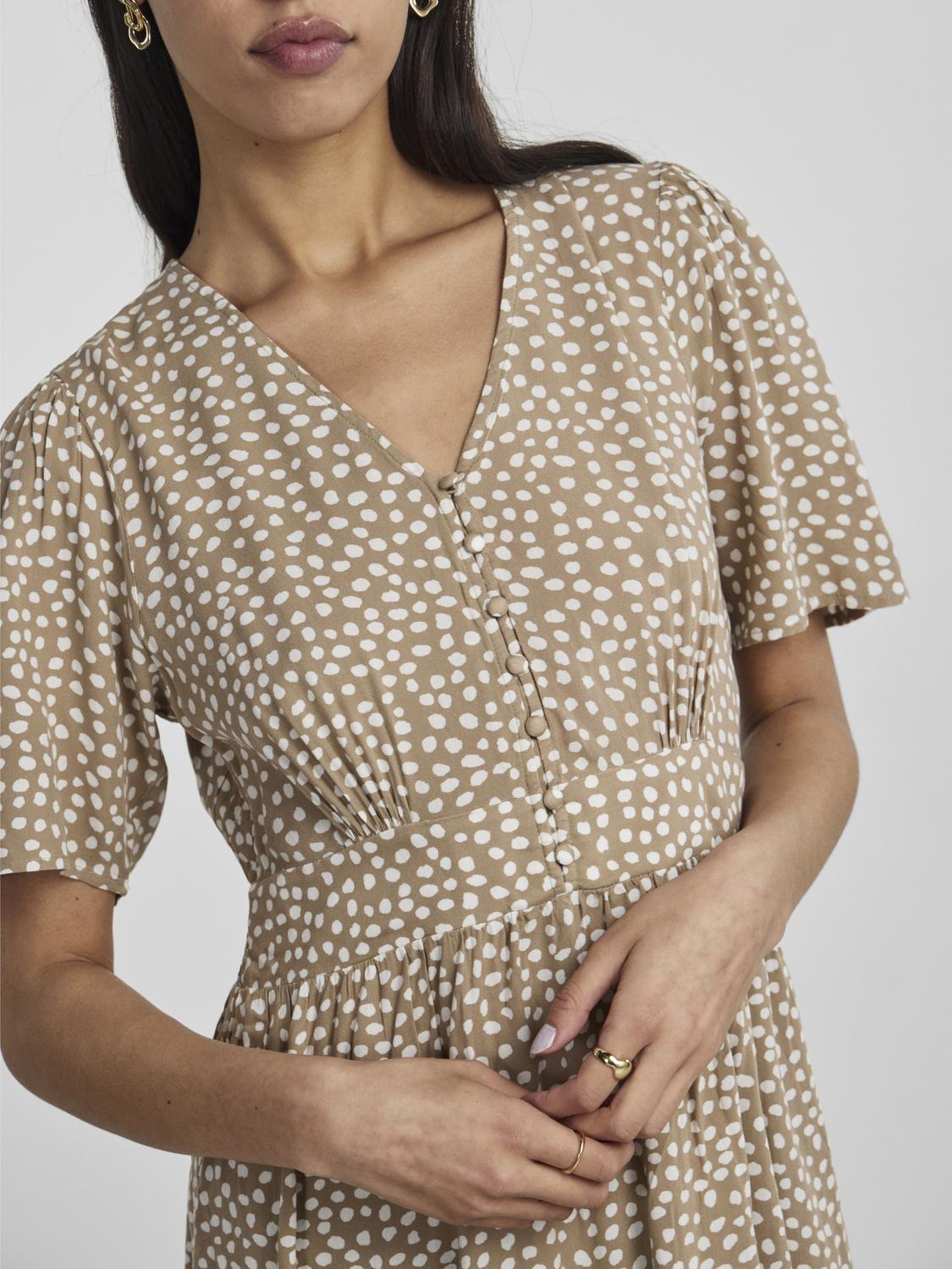 Vestido lunares.
