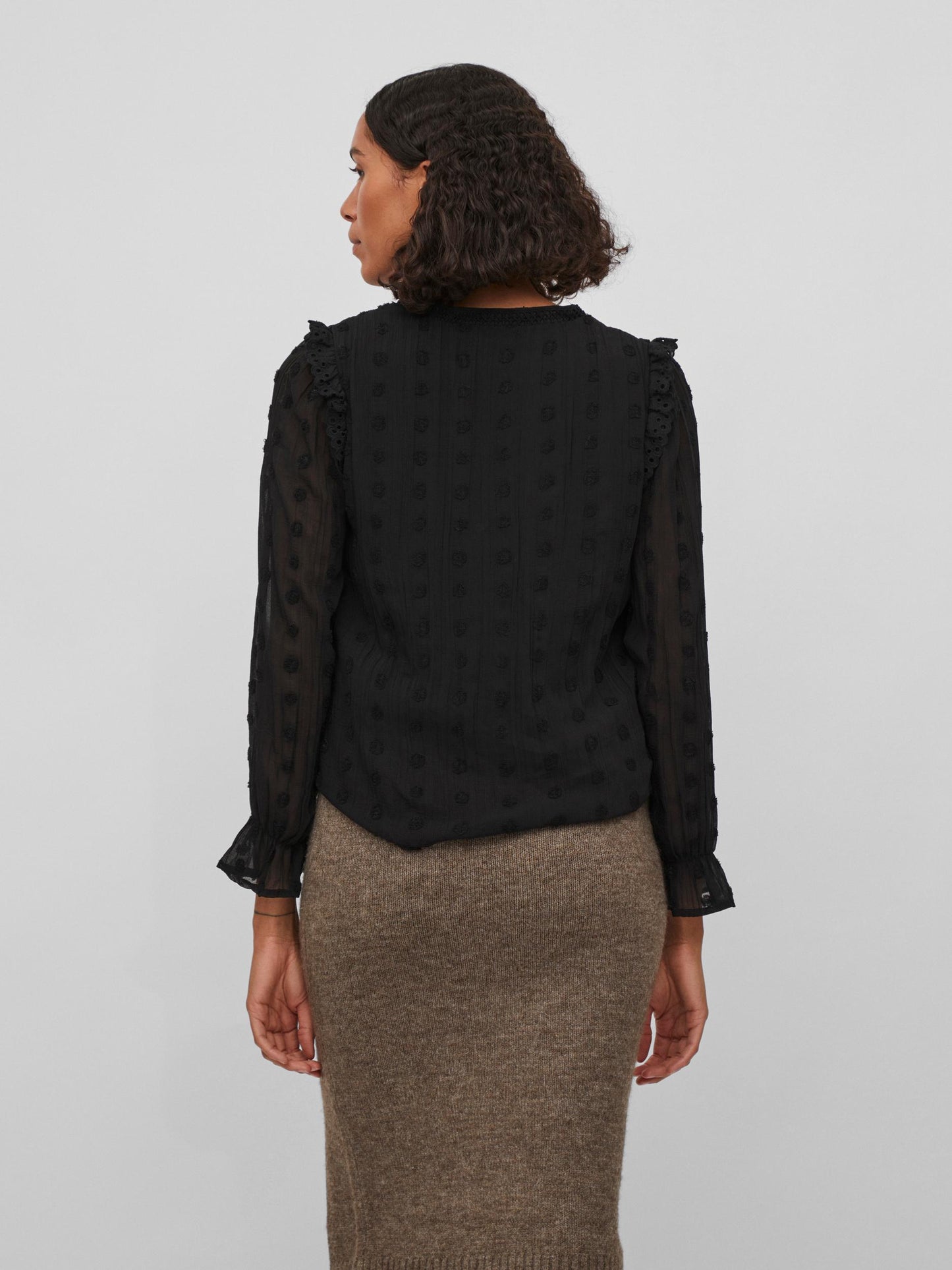 Blusa topos.