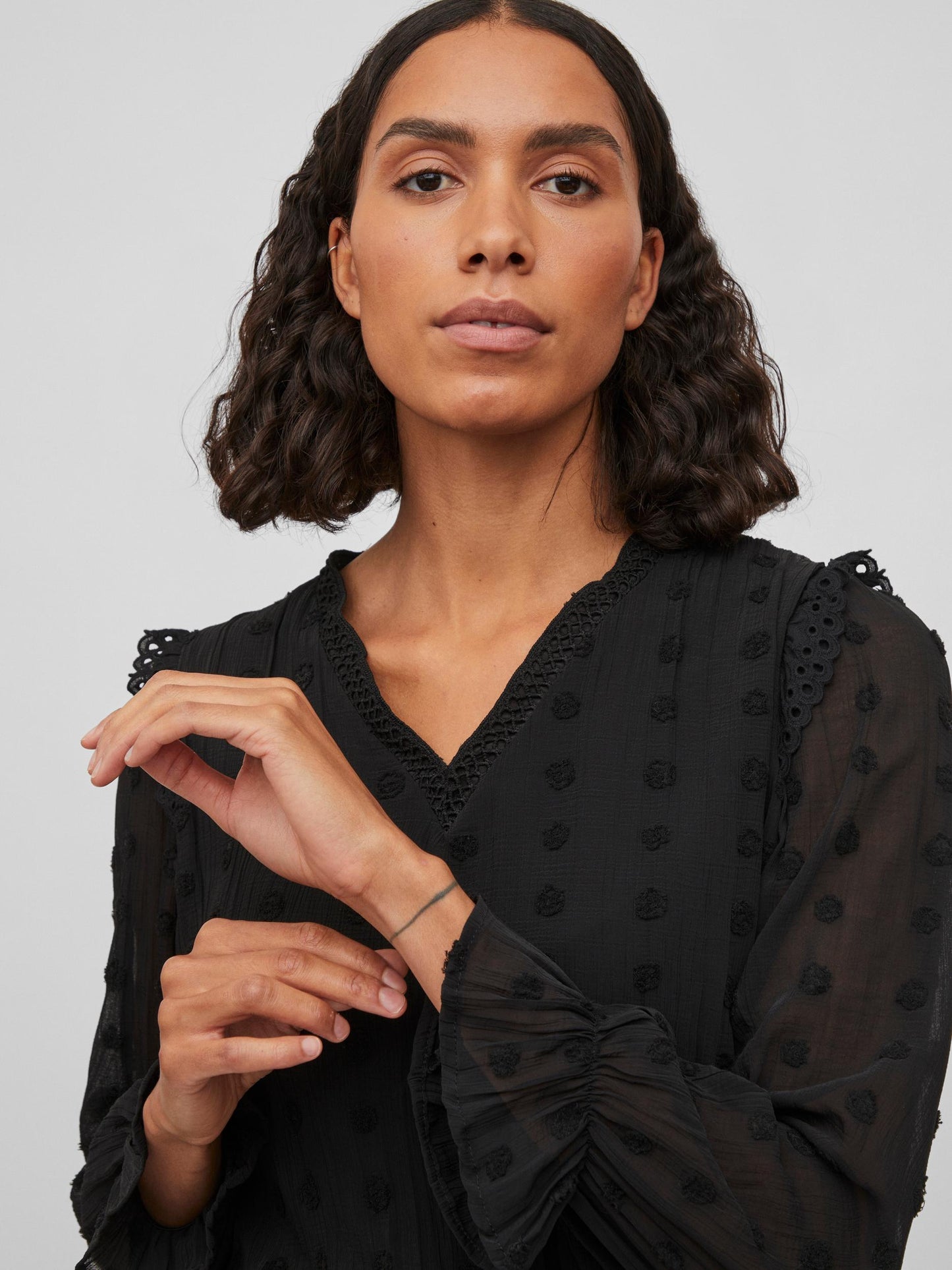 Blusa topos.