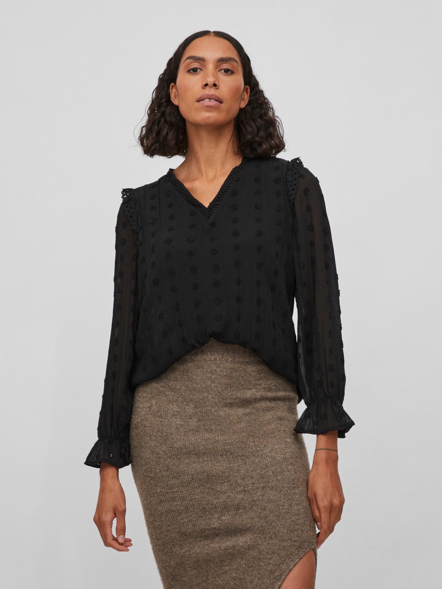 Blusa topos.