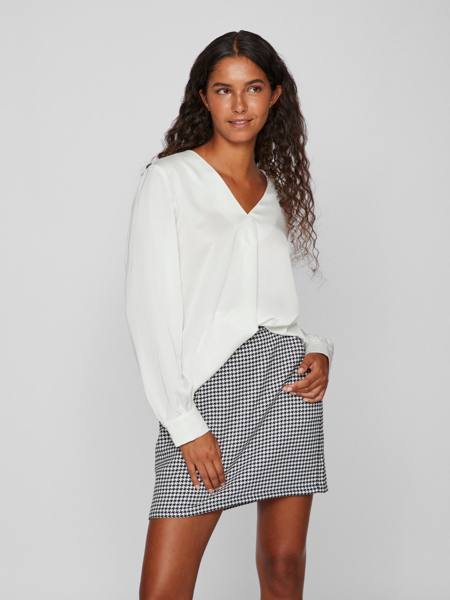 Blusa cuello pico.