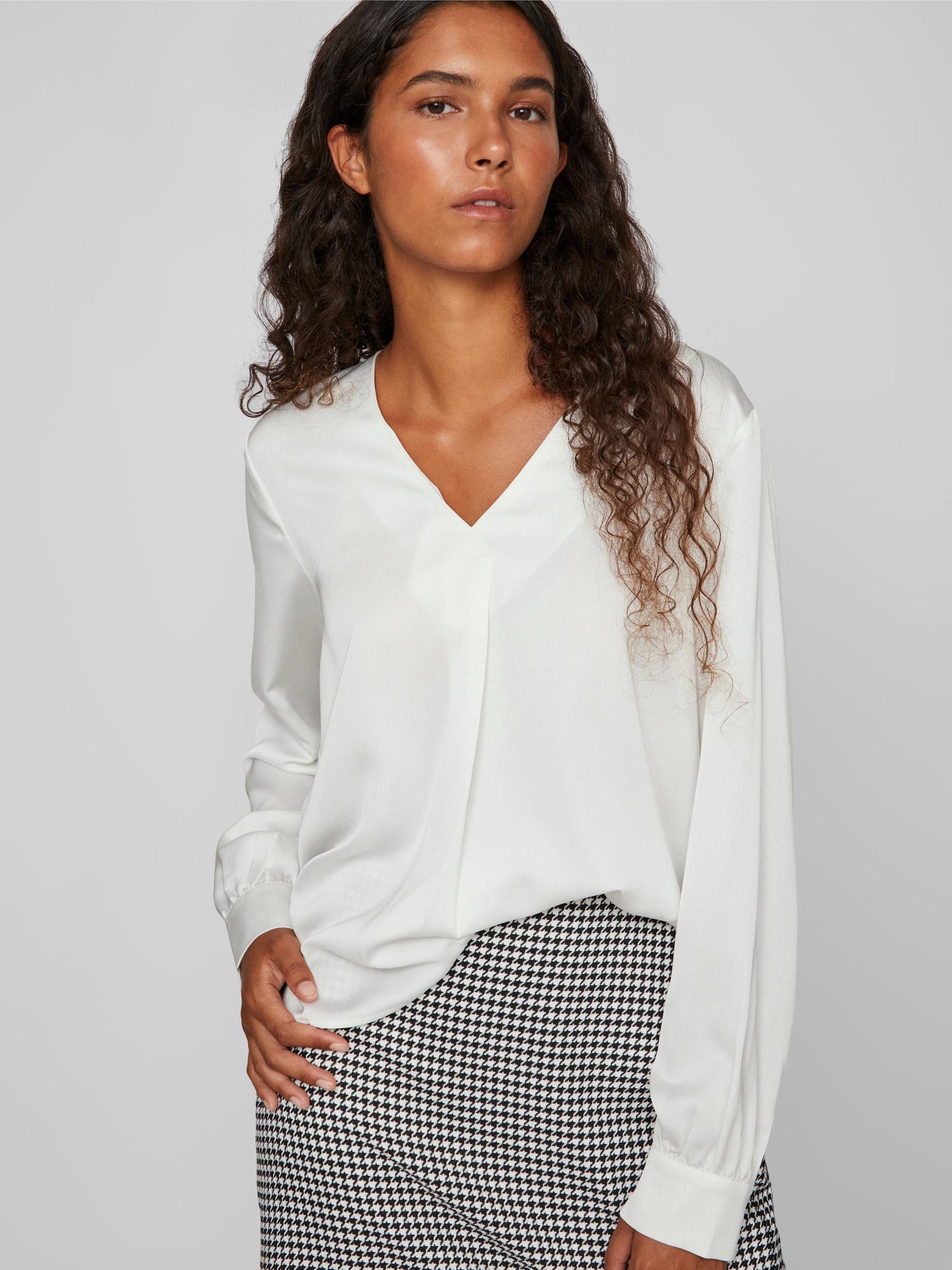 Blusa cuello pico.