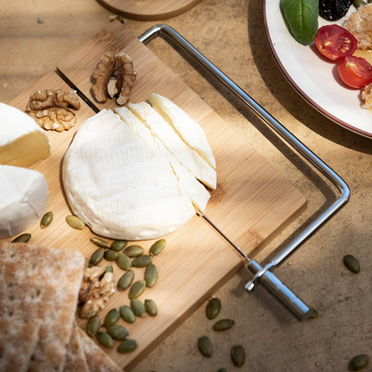 Tabla de bambú para quesos.