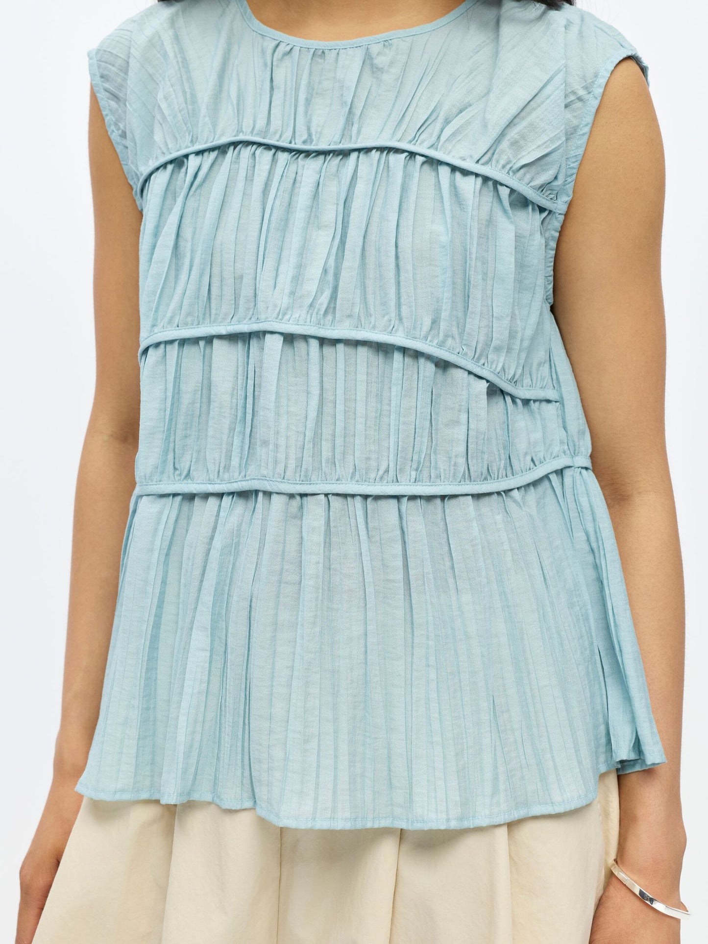 Blusa.