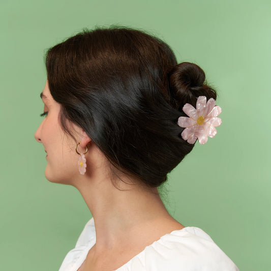 Pinza margarita rosa.
