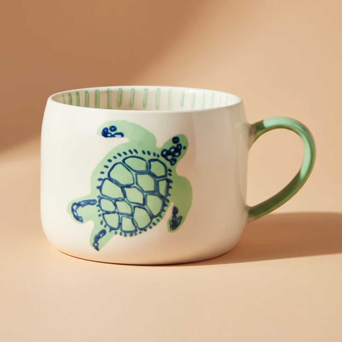 Taza cerámica pintada a mano.