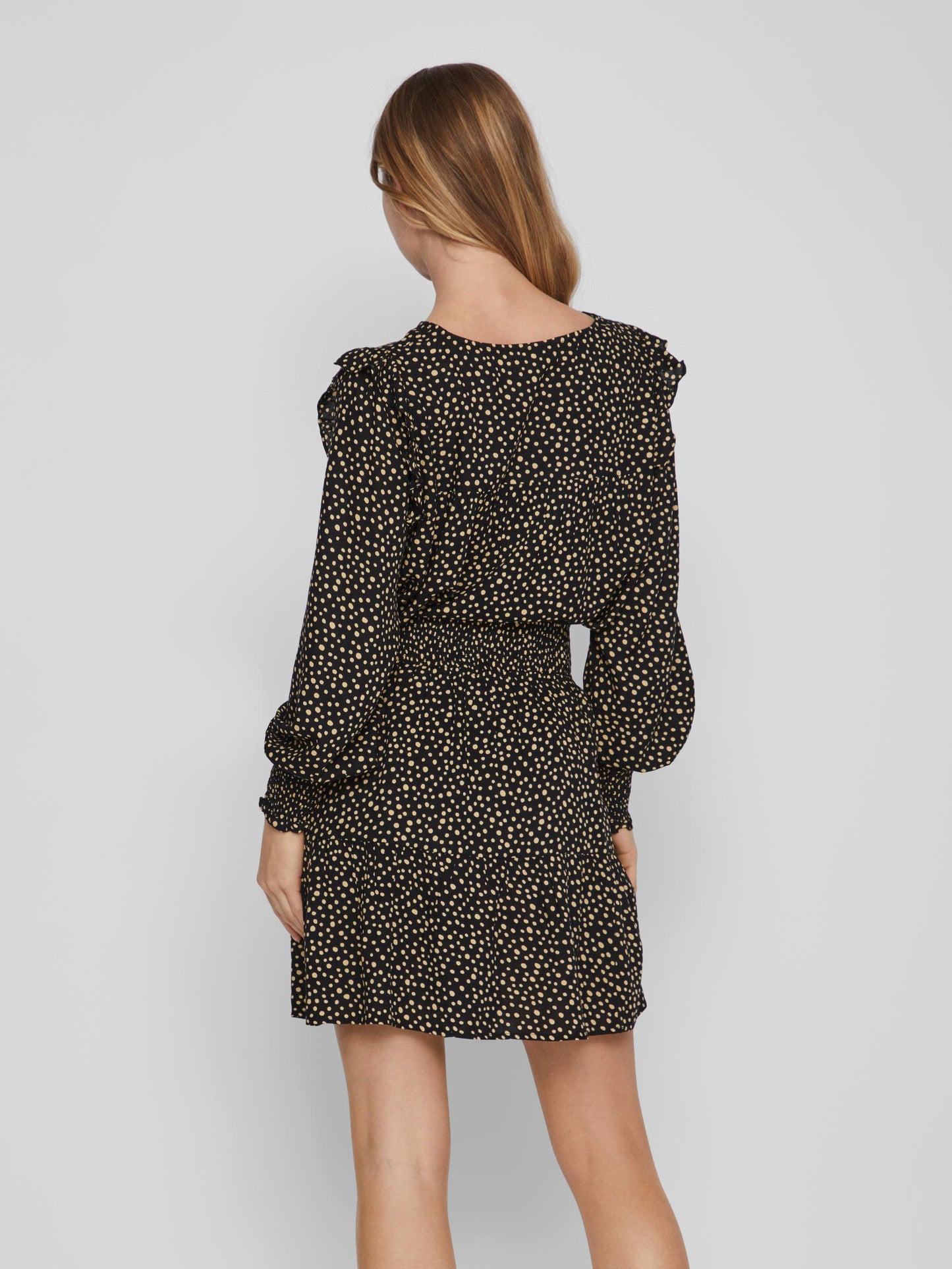 Blusa estampado topos.